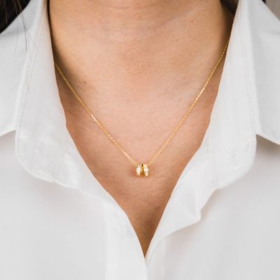 GOLD EMMA NECKLACE ON NECK