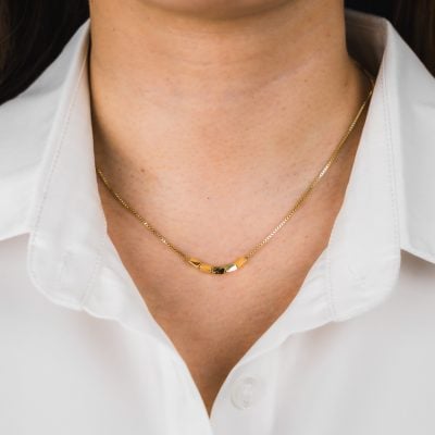 GOLD SOPHIA NECKLACE ON NECK